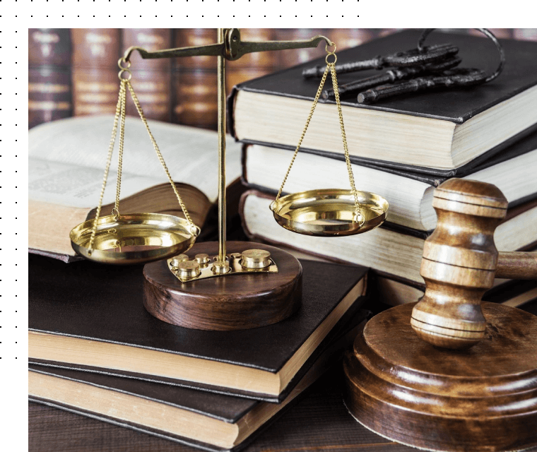 Scale of court with books and a gavel